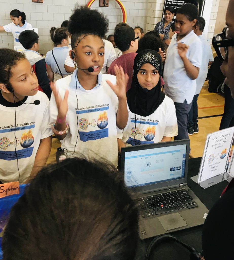 Third grade students present their yearlong culminating research to peers and community members at PS90’s From Climate Change to Climate Action – A Technology Expo. The students analyzed the harmful effects of climate change on Asia’s farming systems and offered their solutions.